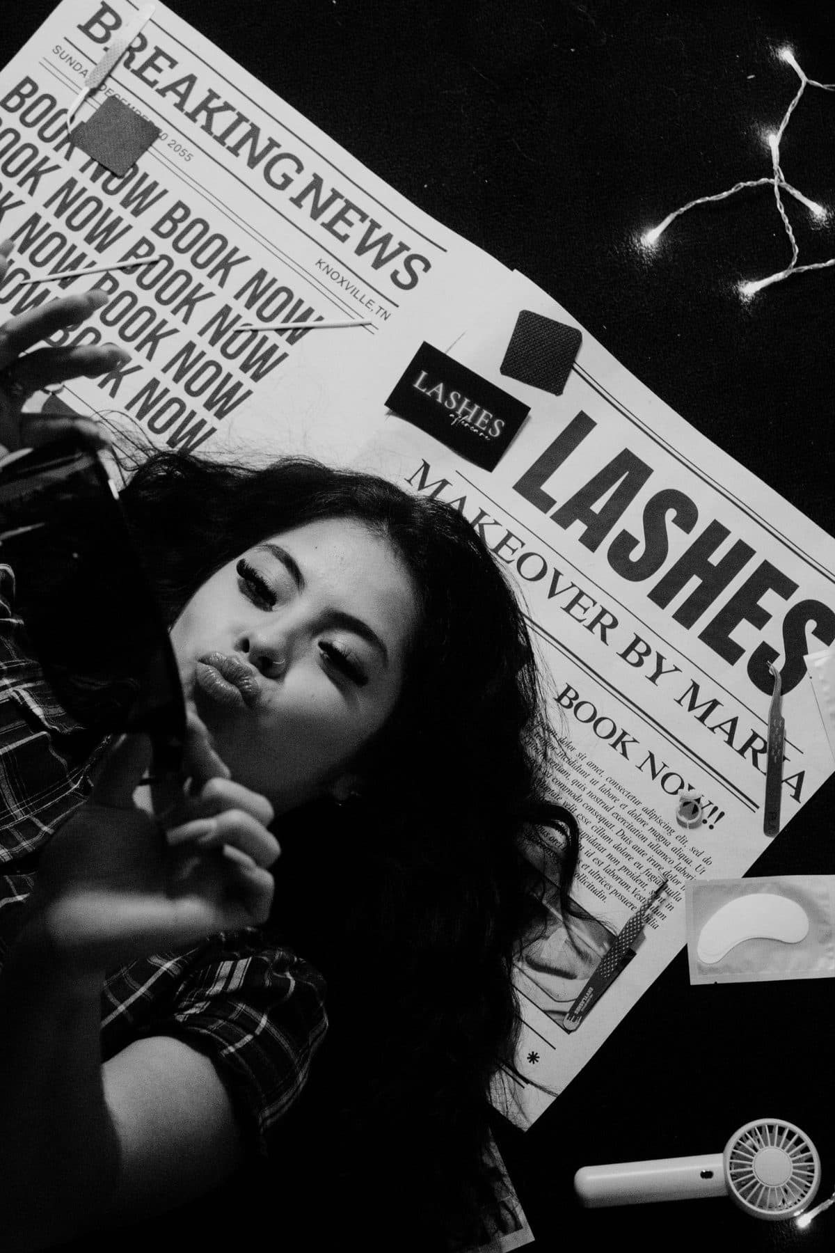 Black and white photo of Maria on a spread of Makeover by Maria newspapers